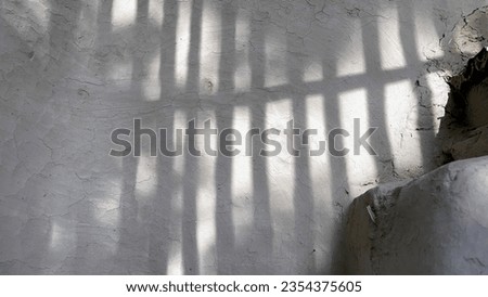 White empty and blank wall with shadows through bamboo, space for text, Royalty-Free Stock Photo #2354375605
