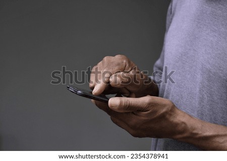businessman paying a bill on mobile phone with new technology with people stock image stock photo