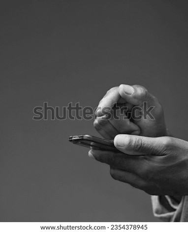 paying a bill on mobile phone with new technology with people stock image stock photo