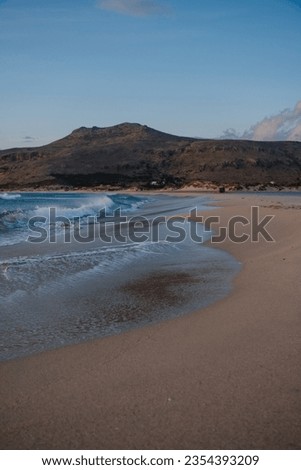 Beautiful Beach with Mountain View in Background at Sunset Elafonisos Island Greece Peloponnes, Golden Hour on the Ocean, Vacation Trip High Instagram Format
