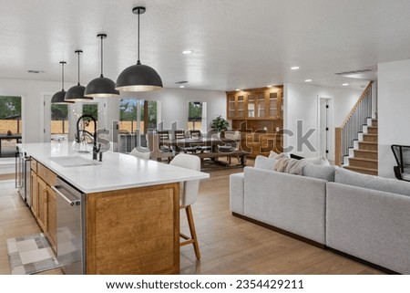 Dallas, texas - July 18th 2023: a home kitchen with light fixtures  Royalty-Free Stock Photo #2354429211