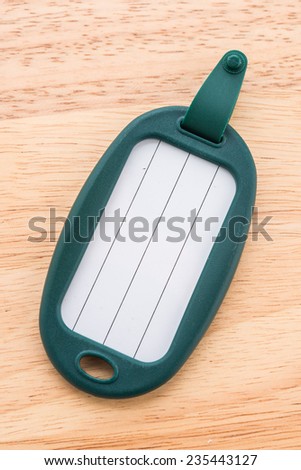 Tag luggage bag on wooden background