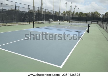 Pickle-ball and Tennis courts available for players Royalty-Free Stock Photo #2354436895