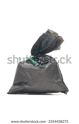 A picture of black waste bag on white background