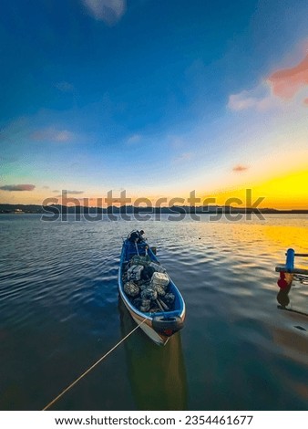 the atmosphere of the evening before Maghrib on a pier  Royalty-Free Stock Photo #2354461677