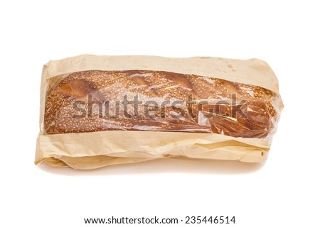 White bread with sesame in a paper bag isolated on white background  Royalty-Free Stock Photo #235446514