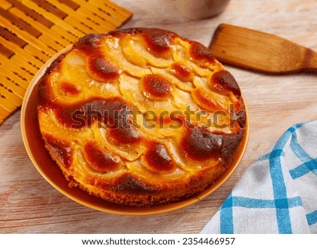 Picture of baked in oven hot tasty apple pie served at plate