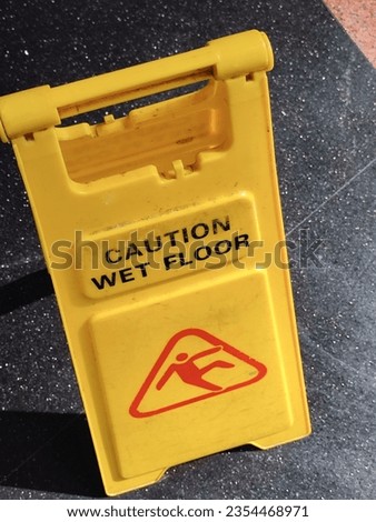 warn people that the floor is wet and prevent them from slipping and falling.