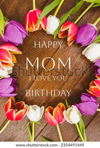 Composite of colourful flowers with happy birthday mom and i love you text on wooden table. Gift, greeting, celebration, wishing, event, template, art, poster and design concept.