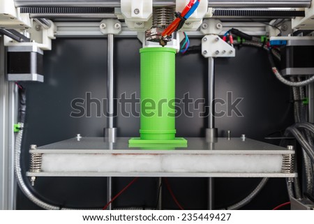 3d printing with light green filament. Royalty-Free Stock Photo #235449427