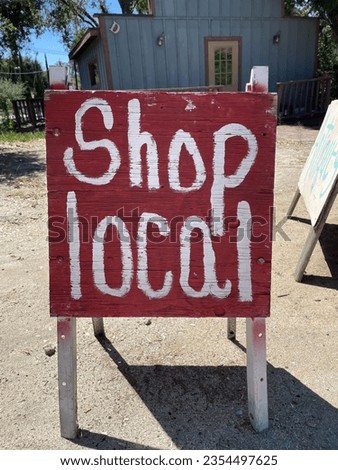 “Shop Local” A-frame sign at a local store.