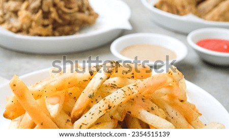 Ultimate Fried Delights Platter: Crispy Mushroom, Chicken Skin, Bakso Tahu, and French Fries with Dipping Sauces