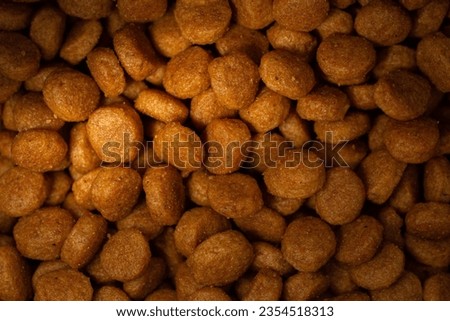 Cat Food Kibbles. Pet Food. Texture background. Abstract background. Close up