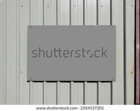 Blank empty signage on steel plate of construction isolated fence, blank billboard, new advertisement on fence, big copy space, blank banner empty signage fixed on wall of construction passage outdoor