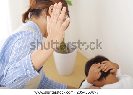 Mothers who train their children (corporal punishment) Royalty-Free Stock Photo #2354559897