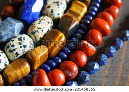 Beautiful semiprecious stone beads Royalty-Free Stock Photo #235458565
