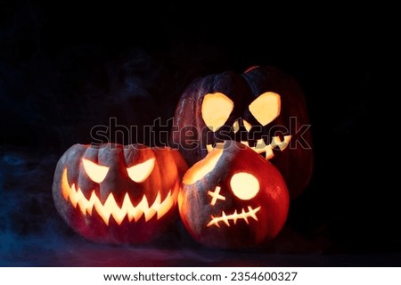 Happy Halloween with spooky and white pumpkin .
