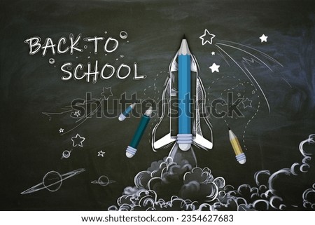Creative back to school sketch with pencils and rocket on chalkboard wall wallpaper. Education and knowledge concept