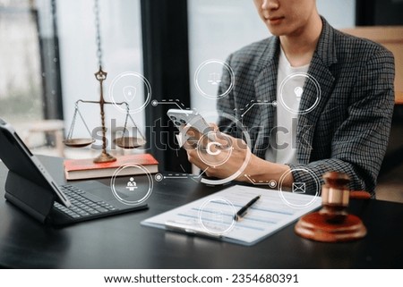 Copyright or patent concept, Business team analyzing data and using smart phone and tablet with virtual screen copyright icon trademark license, Creation ownership against piracy. 
