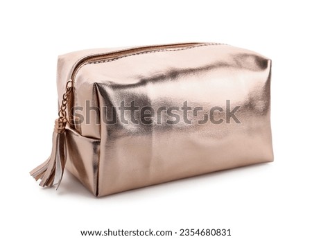Stylish metallic cosmetic bag on white background Royalty-Free Stock Photo #2354680831