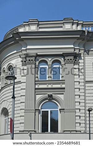 ornate historic building with a rounded corner
