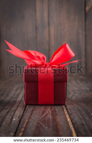 Gift box on wooden background - vintage old effect style pictures