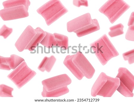 Many bubble gum pillows falling on white background Royalty-Free Stock Photo #2354712739