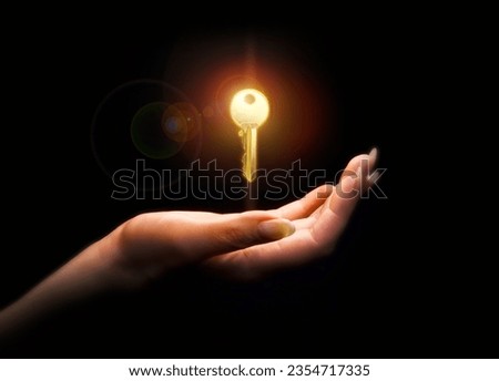 art credit; the key to your own apartment in a woman's hand. Royalty-Free Stock Photo #2354717335