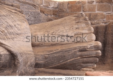 Stone statues of Polonnaruwa Era in Ceylon. Lord Buddha statues in Sri Lanka