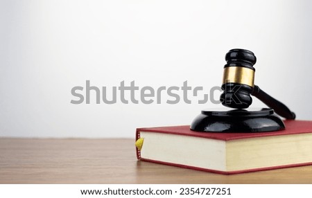 Justice and law concept. Judicial expertise wooden gavel on Law or Legal Book , Symbolizing Justice and Legal System. justice and law concept,legal, jurisprudence. wide view. Royalty-Free Stock Photo #2354727251