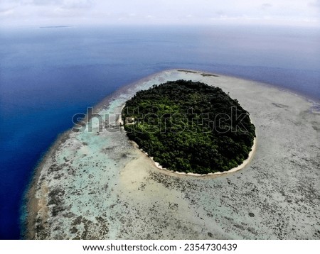 beautiful underwater waterfall Aerial view Blue sea and white rocks Background image of the sea island. Deep sea and corals. Top view of beautiful Sea. Aerial drone shot of turquoise water