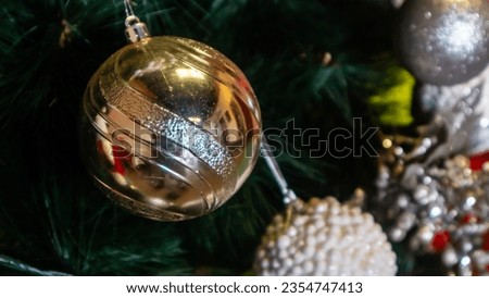 beautiful christmas tree with various hangers
