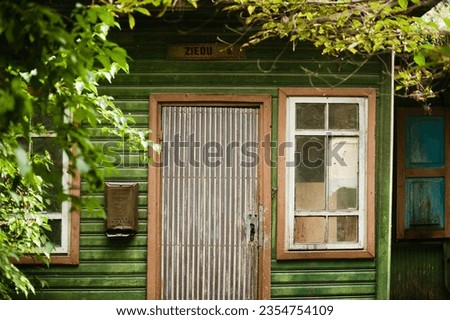 Old house door picture in summer time