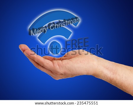 Hand with Christmas decorations