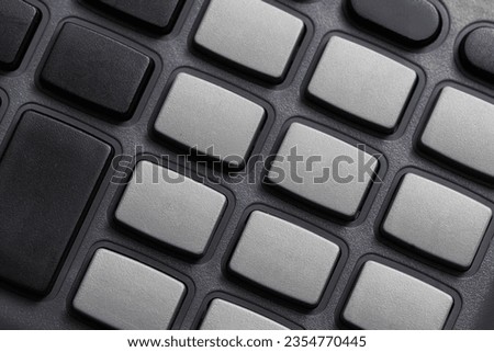 Calculator closeup. Simple object background. Counting device. Macro calculator keyboard. Buttons pattern. Empty buttons texture.