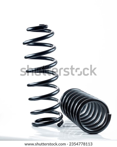 Heavy Duty Coil Springs for a truck on a white background. High quality photo