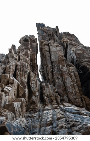 Nature's spires at Playa del Silencio: A coastal symphony of rocky peaks and serene shores. Royalty-Free Stock Photo #2354795309
