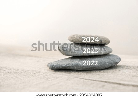 Happy new year, 2024 replace old 2023. New Year 2024 is coming concept idea on beach. Creative photo image can be used as display, printed canvas, website banner, social media post