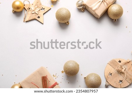 Christmas balls and gift boxes on white background