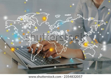 Young businessman using laptop with map icons