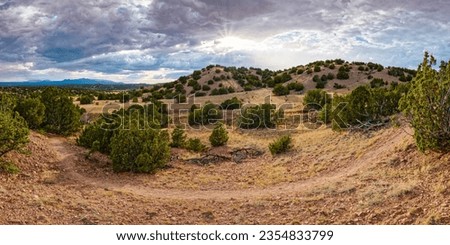 Sun Peaking Over Galisteo Basin Preserve Santa Fe New Mexico Land of Enchantment Royalty-Free Stock Photo #2354833799