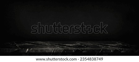 empty table marble black countertop on black wall background,Empty black marble table top with black concrete wall texture background. Royalty-Free Stock Photo #2354838749