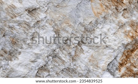 White with gold inclusions natural stone in the Alps. Filled frame. 16x9 background screensaver for webinar