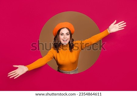 Photo of overjoyed glad petty lady inside pink paper hole open arm glad inviting welcome see you here isolated on beige color background Royalty-Free Stock Photo #2354864611