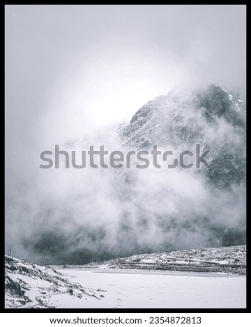 The Sela Pass is a high-altitude mountain pass situated in the state of Arunachal Pradesh, India. This pass is a renowned and picturesque route that traverses the Eastern Himalayas. Royalty-Free Stock Photo #2354872813