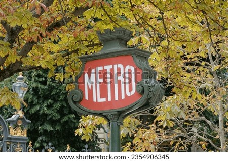 Paris vintage metro entrance post Royalty-Free Stock Photo #2354906345