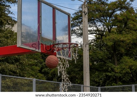 The ball flew into a basketball hoop on a street sports ground in Kharkov