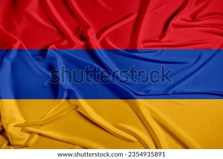 Armenia official national flag of silk fabric texture. Waving Fabric Flag of Armenia