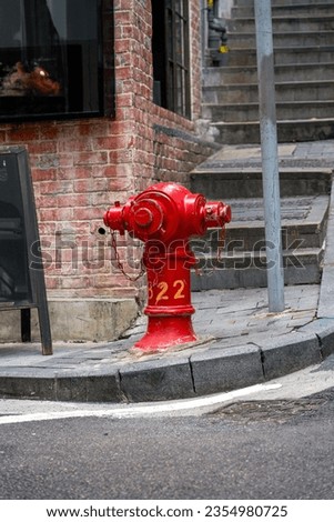 Close up of red fire hydrants on the streets of Central, Hong Kong