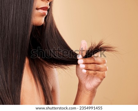Hair, split ends and damage with woman, beauty and keratin treatment fail on studio background. Dry, salon hairstyle mistake and haircare with texture, growth and cosmetic care with breakage Royalty-Free Stock Photo #2354991455